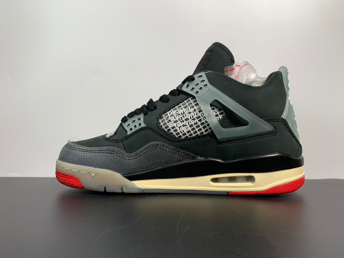 OFF-WHITE x Air Jordan 4 “Bred” CV9388-001